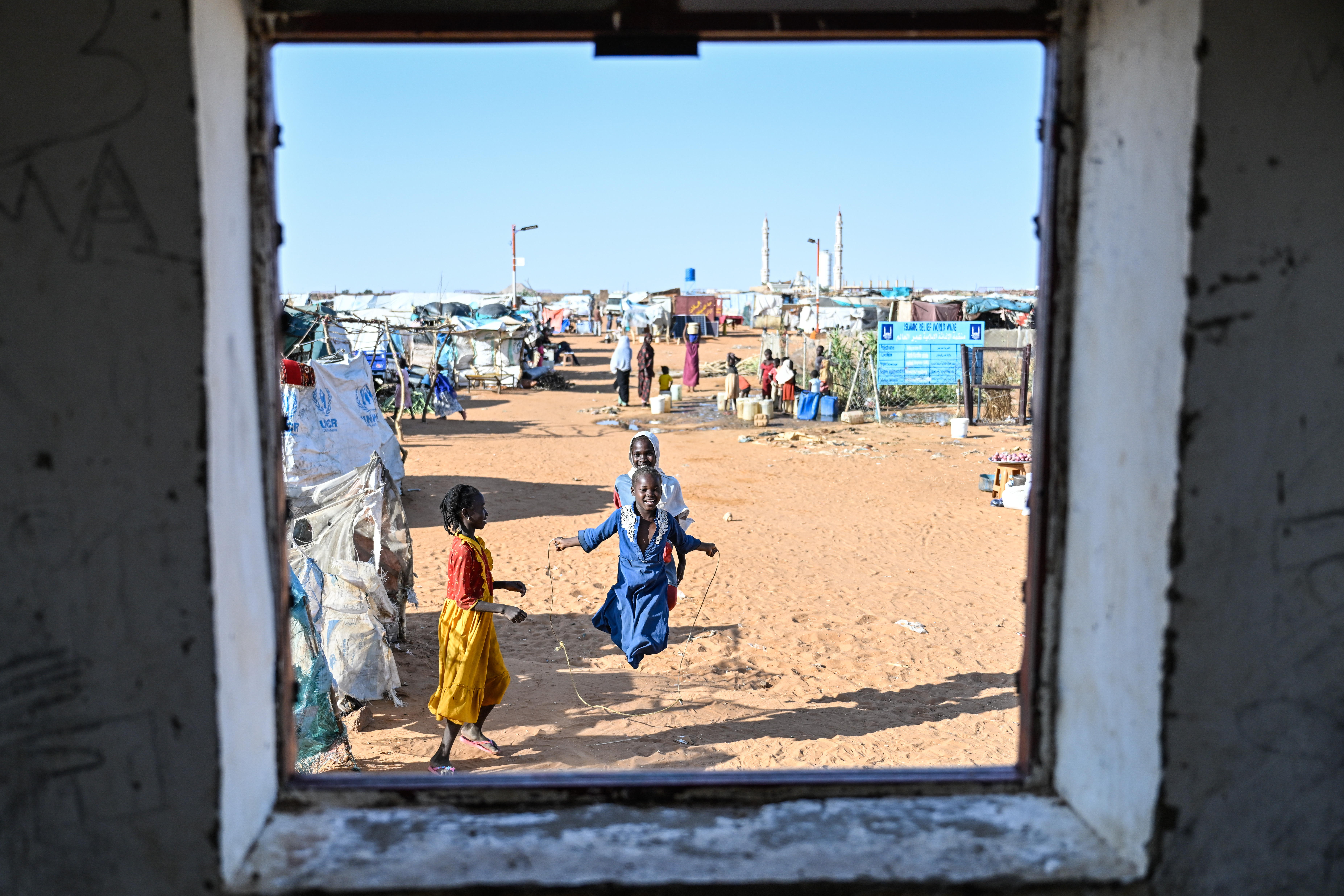 A girl plays in the Al- Mina Al Muwahad displacement camp in El-Obeid, Sudan